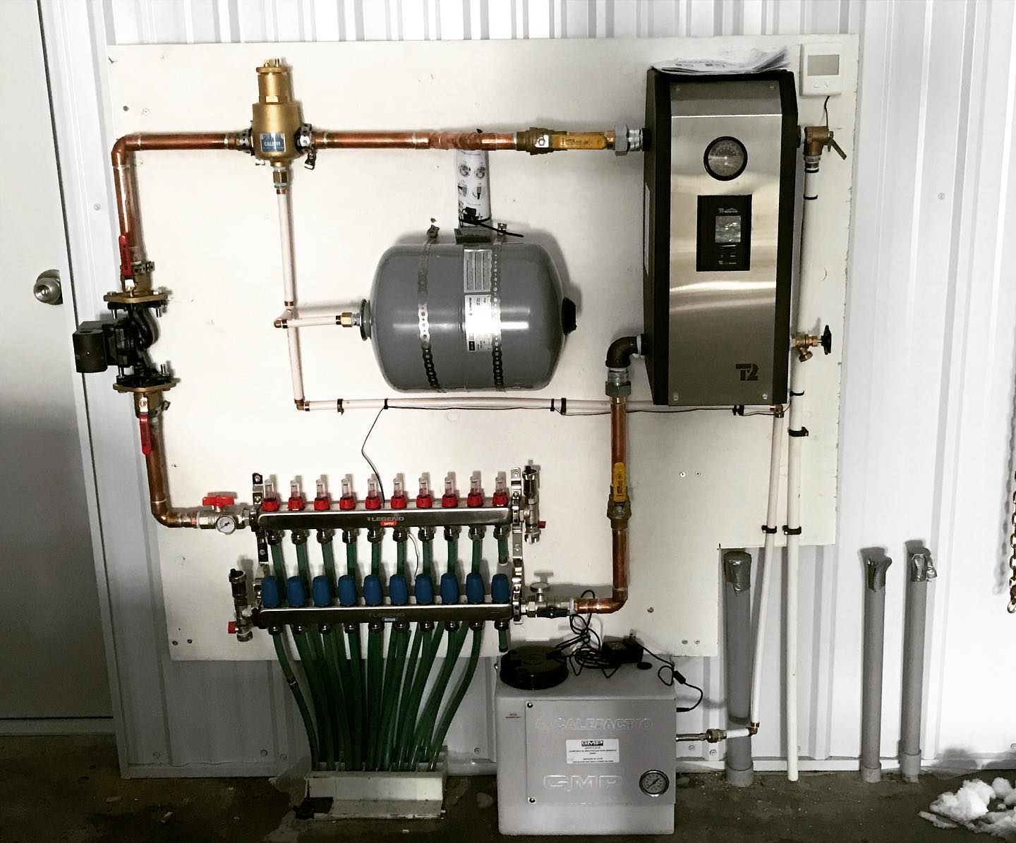 Electric boiler with multi-zone manifold for in-floor heating