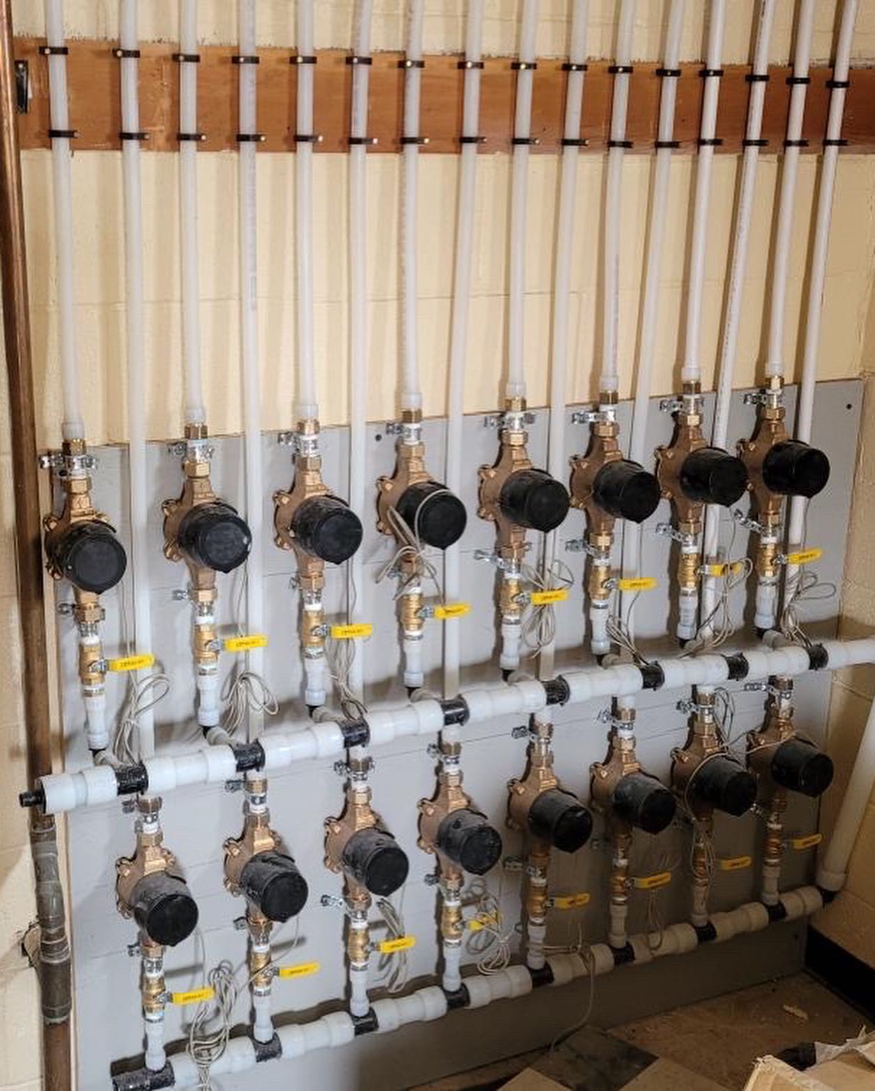 Water meter bank installation for apartment building